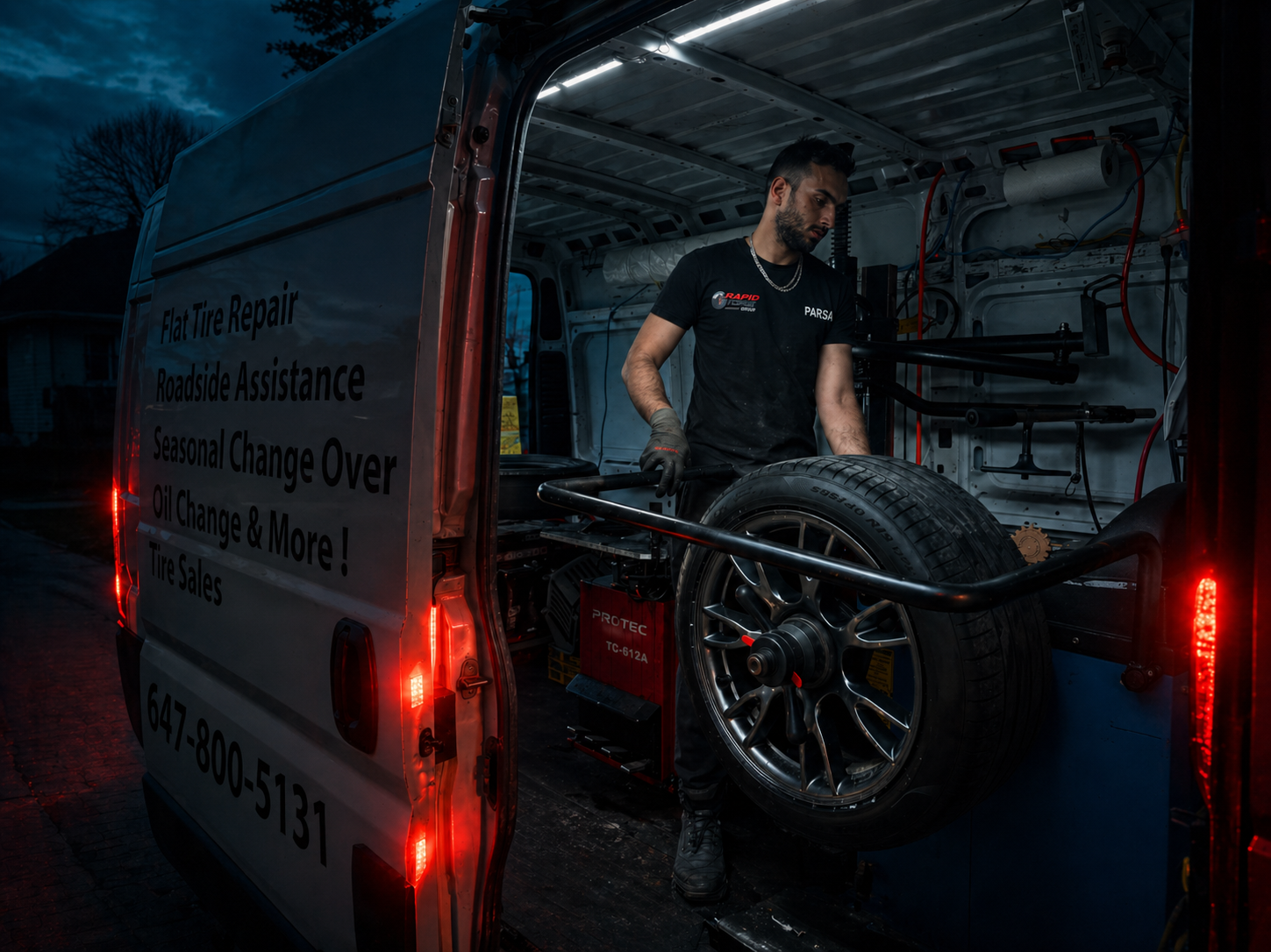 Mobile tire service van at a residential driveway
